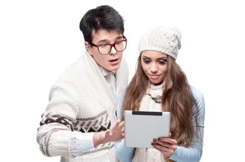 Young casual couple using tablet Stock Photos