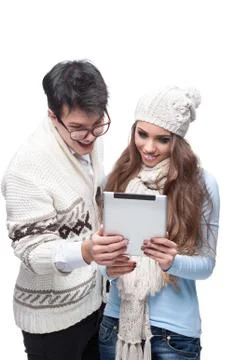 Young casual couple using tablet Stock Photos