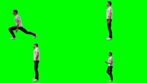 Young casual man guy is kicking punching striking and hitting on green screen 動画素材 328634192