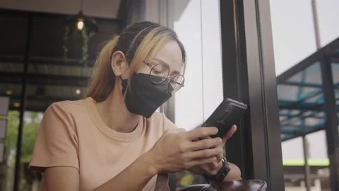Young casual woman looking at camera Stock Footage 198295574