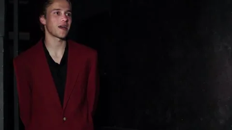 Young Caucasian actor training on his movie devil role in the studio Stock Footage 262237388