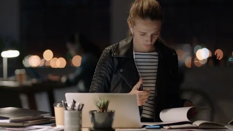 Young caucasian business woman working late using laptop computer browsing Stock Footage