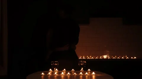 Young caucasian couple dancing under candle light Stock Footage 159548686