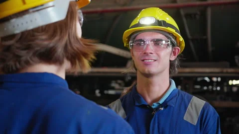 Young caucasian engineer man and woman maintenance train diesel engine in s.. Stock Footage 253280788