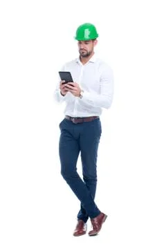 Young caucasian engineer using digital tablet isolated Foto stock