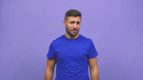 Young caucasian handsome man doing a suicide gesture, feeling sad and scared Stock Footage 138666266