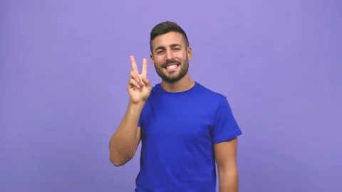 Young caucasian handsome man fun and happy, positive and natural, doing a Stock Footage 138666182