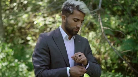 Young caucasian man in classical suit posing Stock Footage