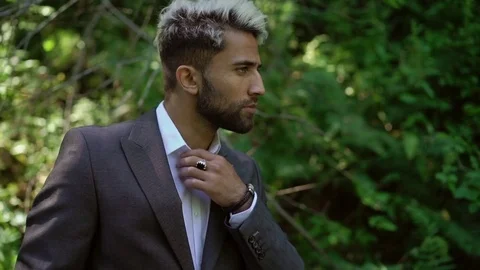 Young caucasian man in classical suit posing Stock Footage 79655985