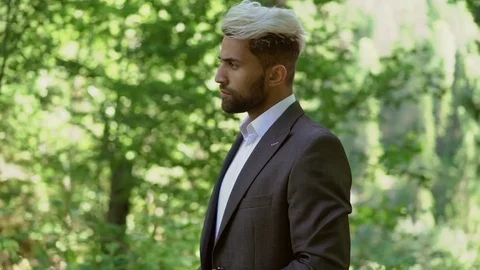 Young caucasian man in classical suit posing Stock Footage 79656013