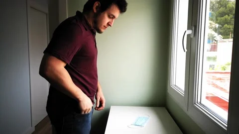 Young caucasian man getting ready to leave his home, picking his wallet, the 스톡 동영상 131419075