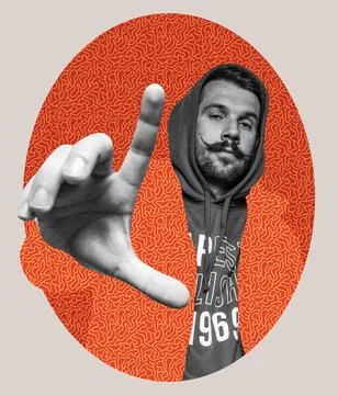 Young caucasian man, guy in jacket with hood in the same color as background of Stock Photos