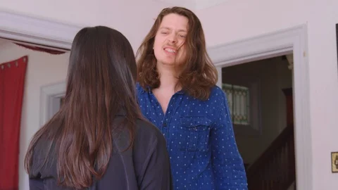 A young caucasian man physically abusing his girlfriend - slow motion Stock Footage 129849906