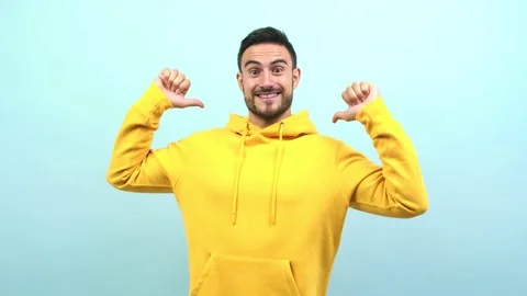 Young caucasian man proud and confident, pointing fingers, example to follow, Video stock 138662953