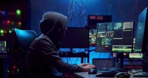 Young Caucasian man software developer working at night on two computers Stock Footage 124348670