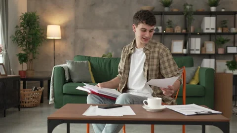 Young caucasian man student study at home learn exam or prepare lesson Stock Footage 264426693