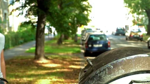 Young caucasian man throwing out trash Stock Footage 41505840