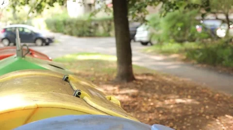 Young caucasian man throwing out plastic materials, high angled, side view Stock Footage 41510230