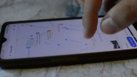 Young caucasian man use google gps app on the phone. phone gps Video stock 200123847