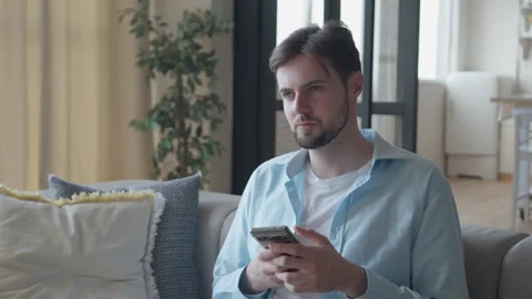 Young Caucasian Man Using Smartphone at Dinning Room Stock Footage 301241492