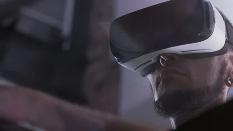 Young Caucasian man in VR headset. Augmented future. Alternative world. Virtual Stock Footage 98181852