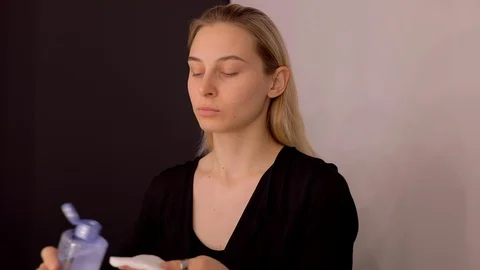 Young caucasian model applying professional makeup. beautiful woman applying Stock Footage 113807094