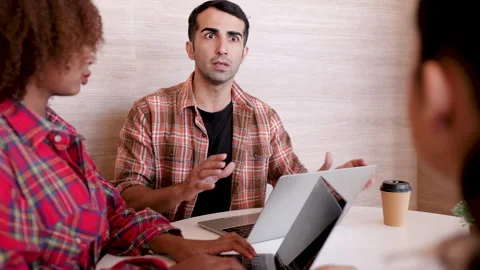 Young Caucasian tutor teaching multiethnic student girls in private classes.. Stock Footage 246752525