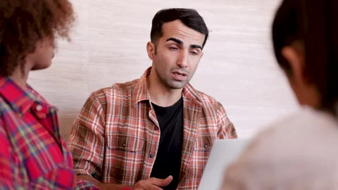 Young Caucasian tutor teaching multiethnic student girls in private classes.. Stock Footage 246774094