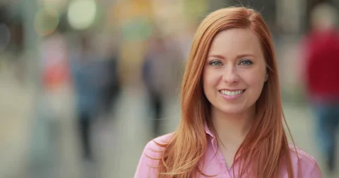 Young caucasian woman in city smile face portrait Stock Footage