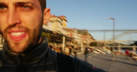 Young Cheerful Tourist Man in Ribeira District, Porto, Portugal Stock Footage 59123964