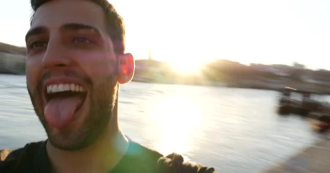 Young Cheerful Tourist Man in Ribeira District, Porto, Portugal Stock Footage 59123983