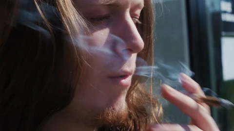 Young Chef Smoking During Kitchen Break Vidéo 307066222