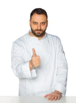 Young chef on white background. Stock Photos