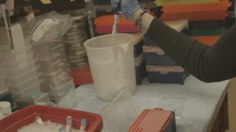 Young chemist in a laboratory Stock Footage 129411503