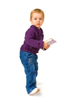 Young child with a book Stock Photos