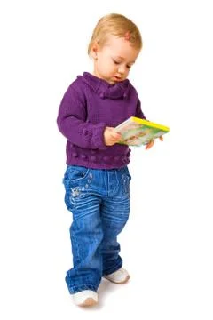 Young child with a book Stock Photos