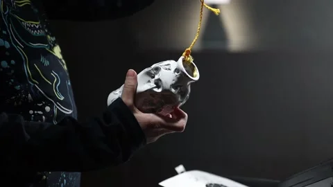 Young child is checking air bottle and paper target. Stock Footage 171607968