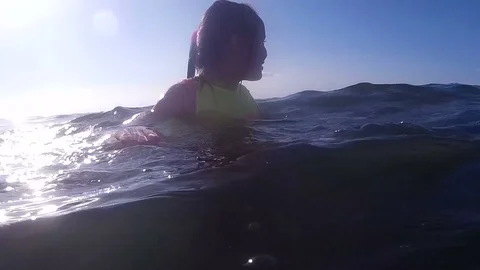 Young child in deep water Stock Footage 79736502