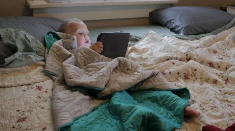  Young child on Electronic device. Stock Footage 49896672