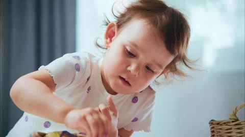 A Young Child Engaged in Playful Creativity with Colorful Clay, Exploring Видео 315932398