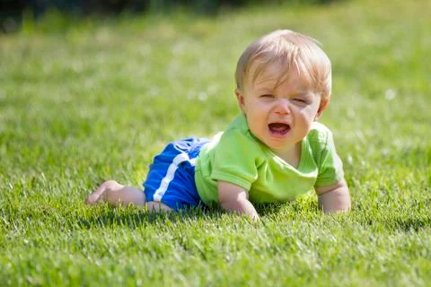 Young child in grass Stock Photos