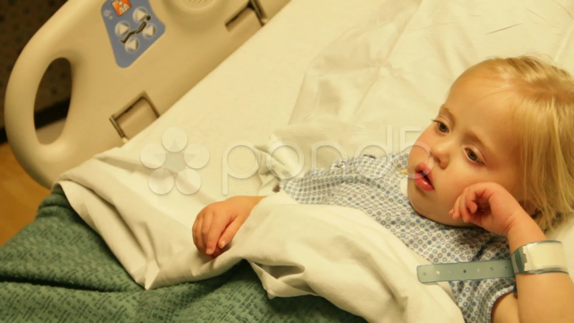 Young child in hospital bed HD8469 | Stock Video | Pond5