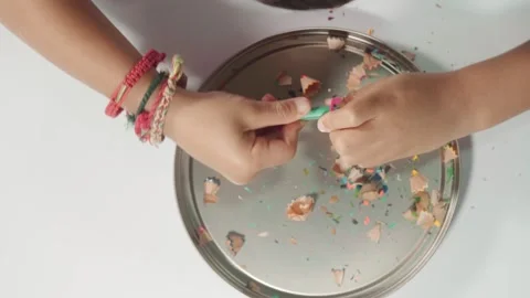 Young child independently sharpening a colored pencil, practicing hand stre.. Stock-Footage 342577407