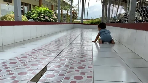 Young child interacting with a peer using a specialized adaptive seating chair Видео 326843651