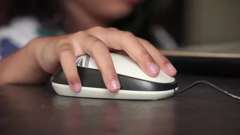 Young child learning with computer mouse. Online education, kids technology Stock Footage 331636102