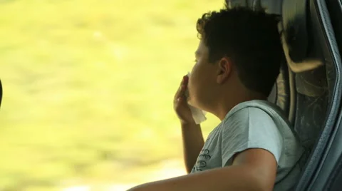 Young child looking out bus window 2 Stock Footage 64732482