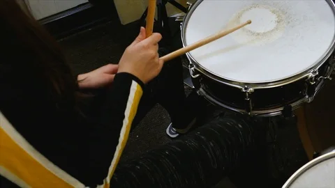 Young child plays drums on drumset Stock Footage 120560614