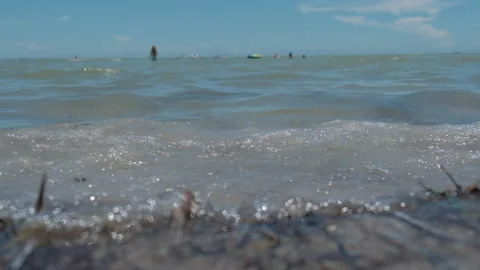 Young child runnign through waves Stock Footage 163128265