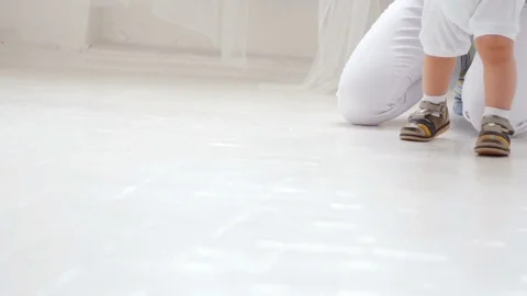 Young Child Taking First Steps Stock Footage