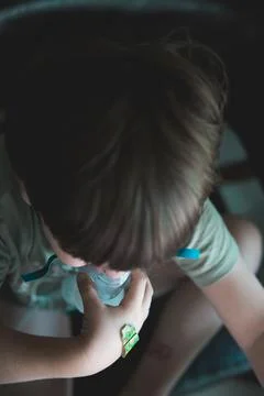 A young child using a nebulizer mask for asthma and respiratory treatment, .. Stock Photos
